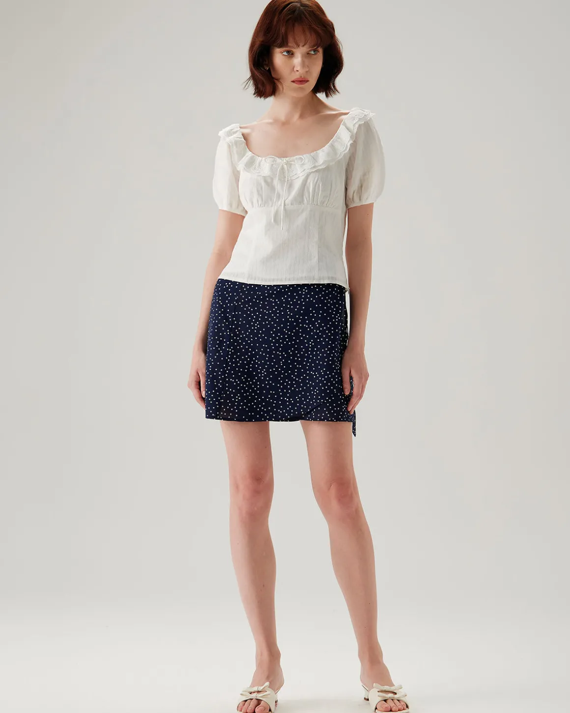 Navy Polka Dot Wrap Mini Skirt