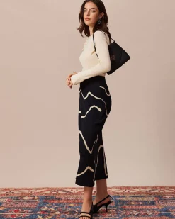 The Beige Ribbed Cut Out Bowknot Knit Top