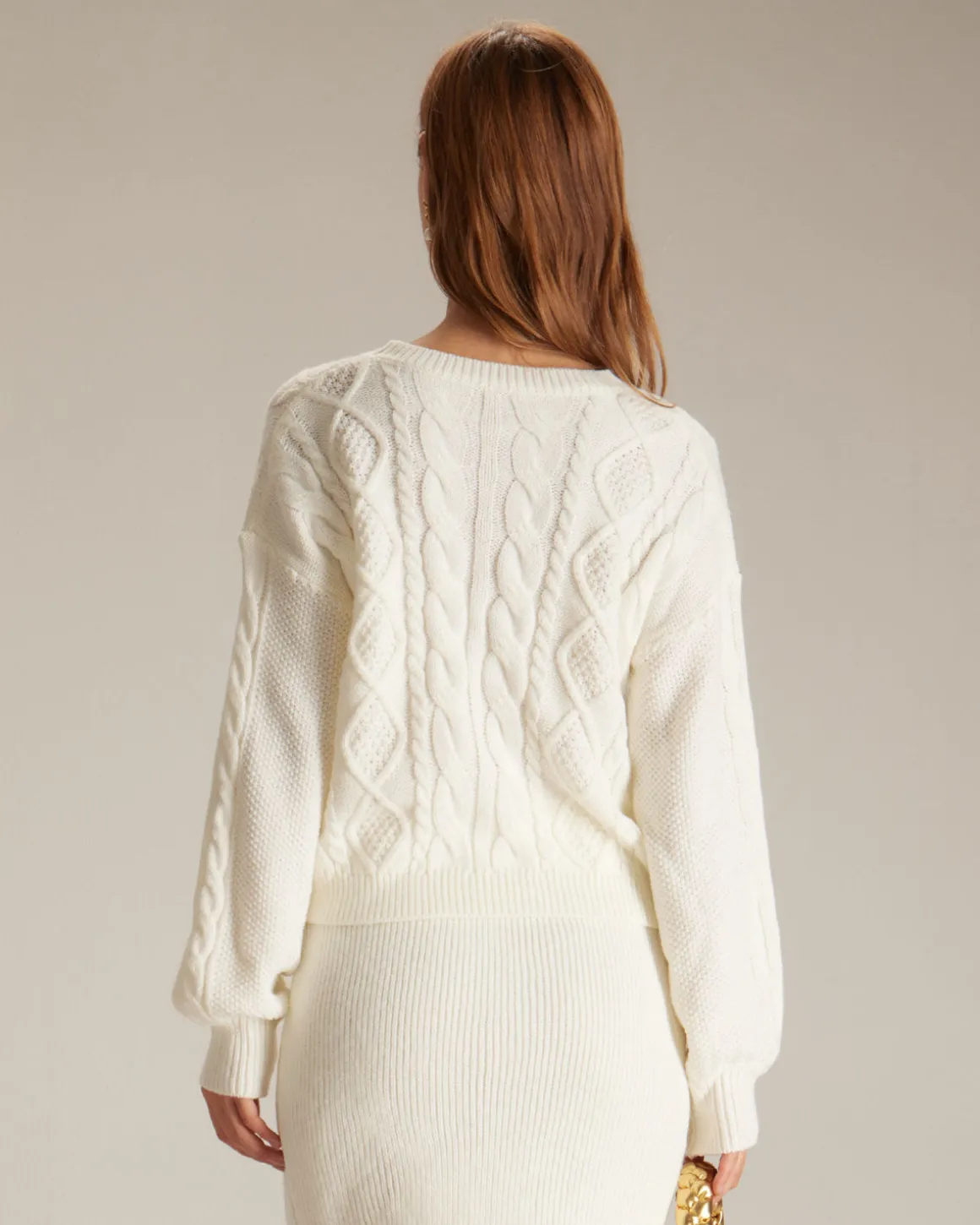 The Beige Round Neck Ribbed Cable Sweater