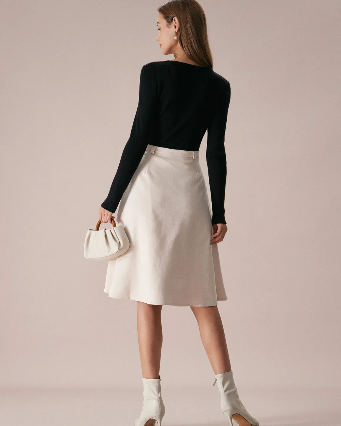 The Black Boat Neck Bowknot Front Knit Top