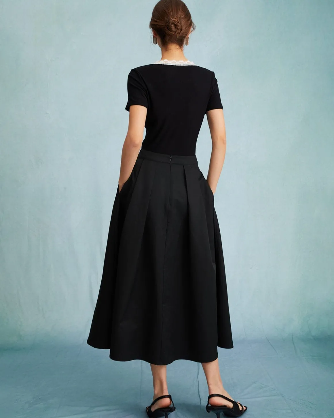 The Black High Waisted Pleated Midi Skirt
