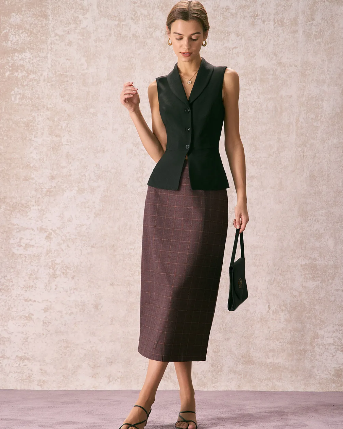 The Black Lapel Sleeveless Button Up Vest