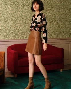 The High Waisted PU Leather A-line Mini Skirt