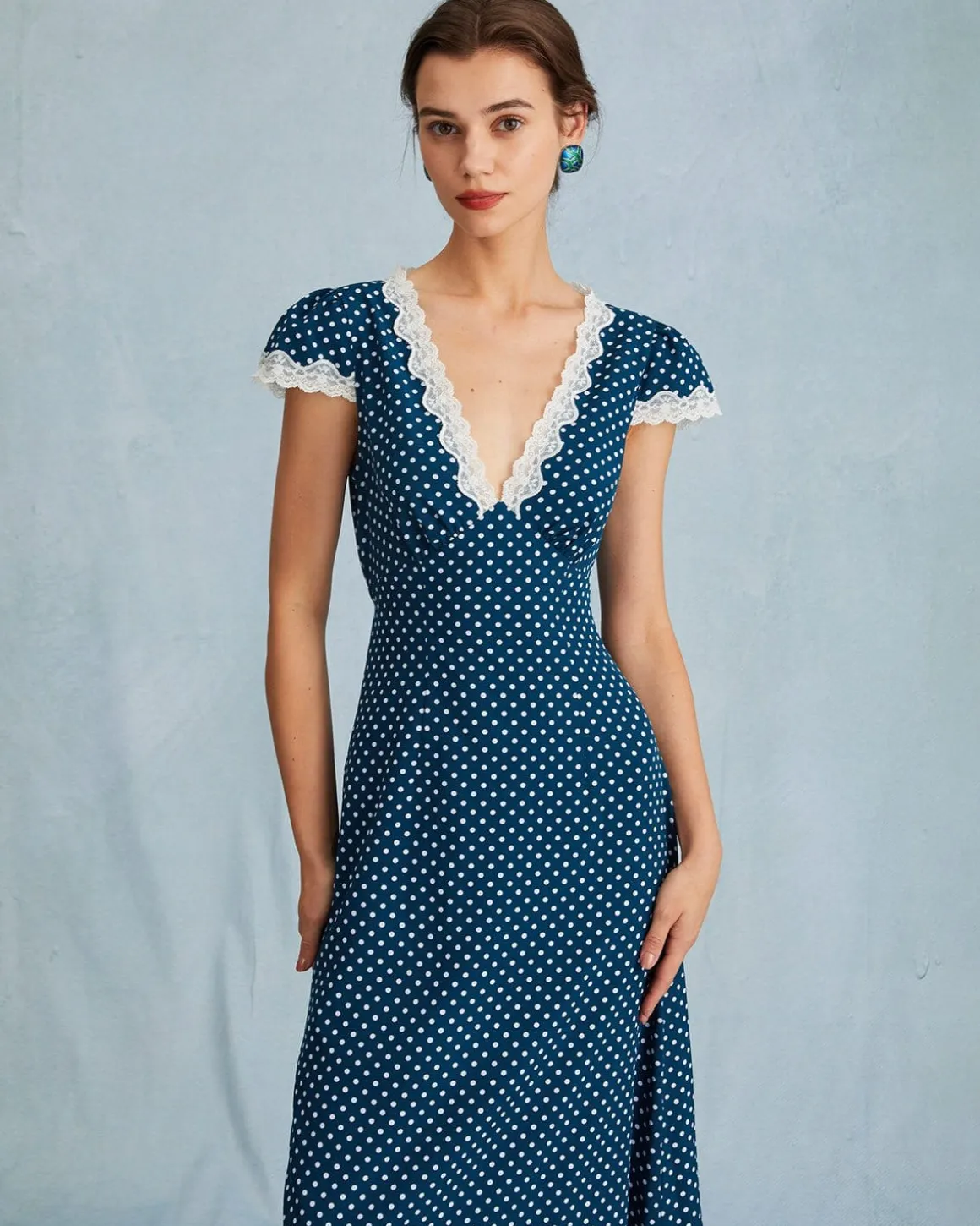 The Navy V Neck Polka Dot Lace Ruched Maxi Dress