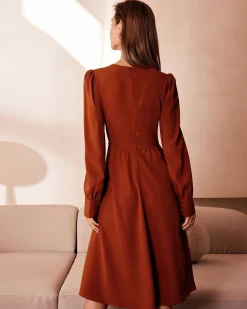 The Orange V Neck Pleated Button Midi Dress
