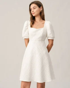 The Solid Textured Puff Sleeve Mini Dress