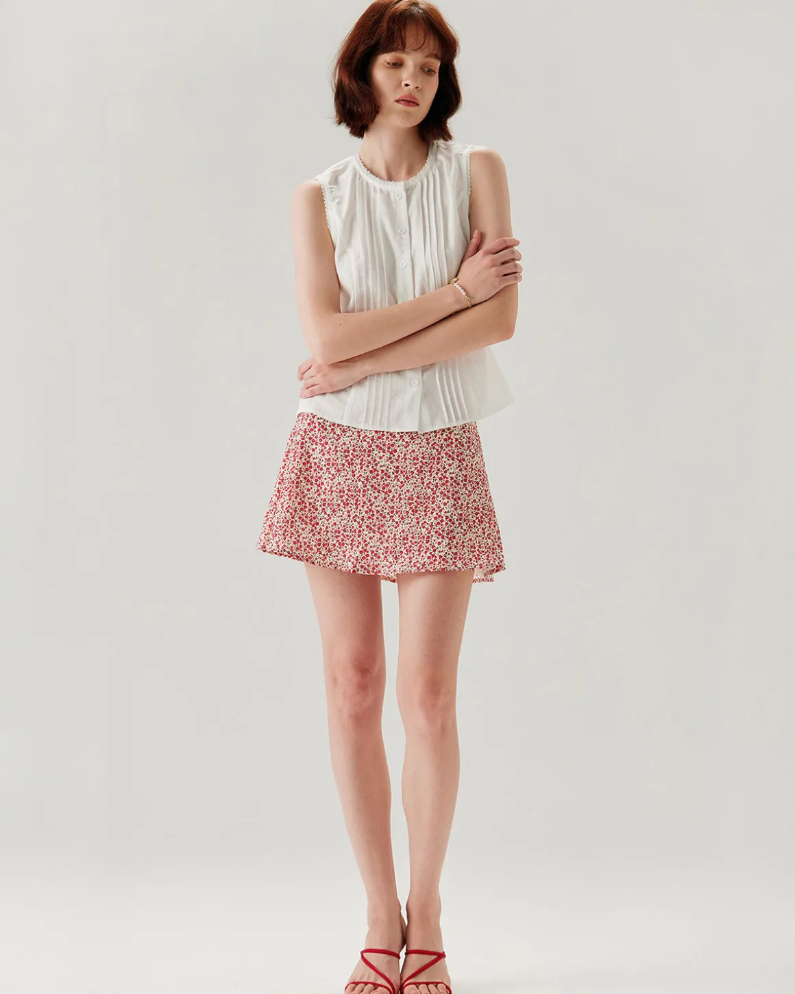 White Crew Neck Button Sleeveless Blouse