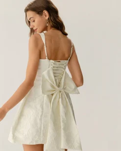 White Textured Bowknot Slip Mini Dresses