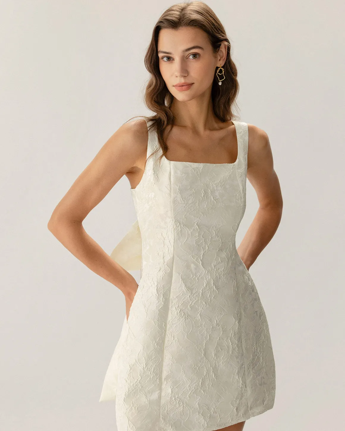White Textured Bowknot Slip Mini Dresses