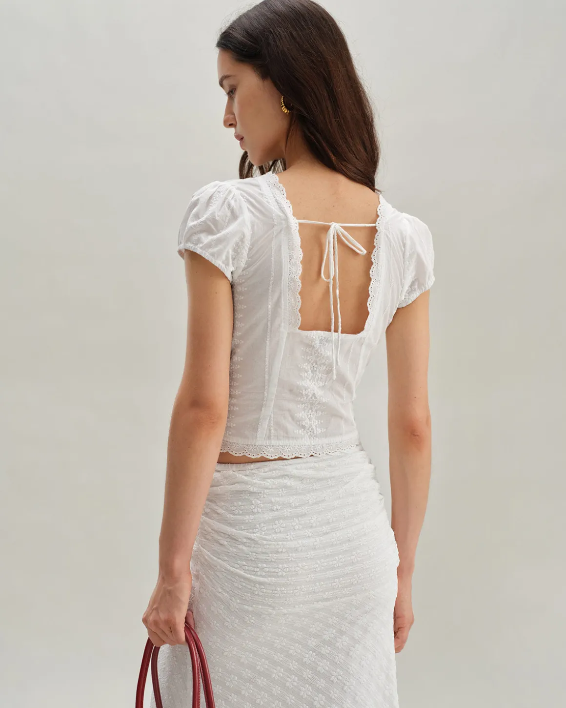 White Textured Cap Sleeve Blouse